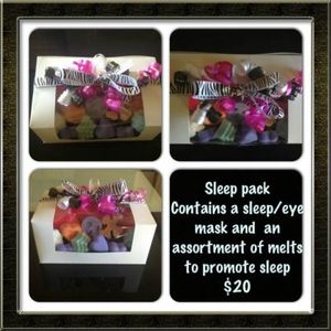 An assortment of soy wax melts that promote sleep and a sleep/eye mask - $20.