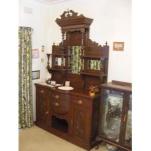 Two piece ornately carved Cedar Victorian Sideboard from the 1870's